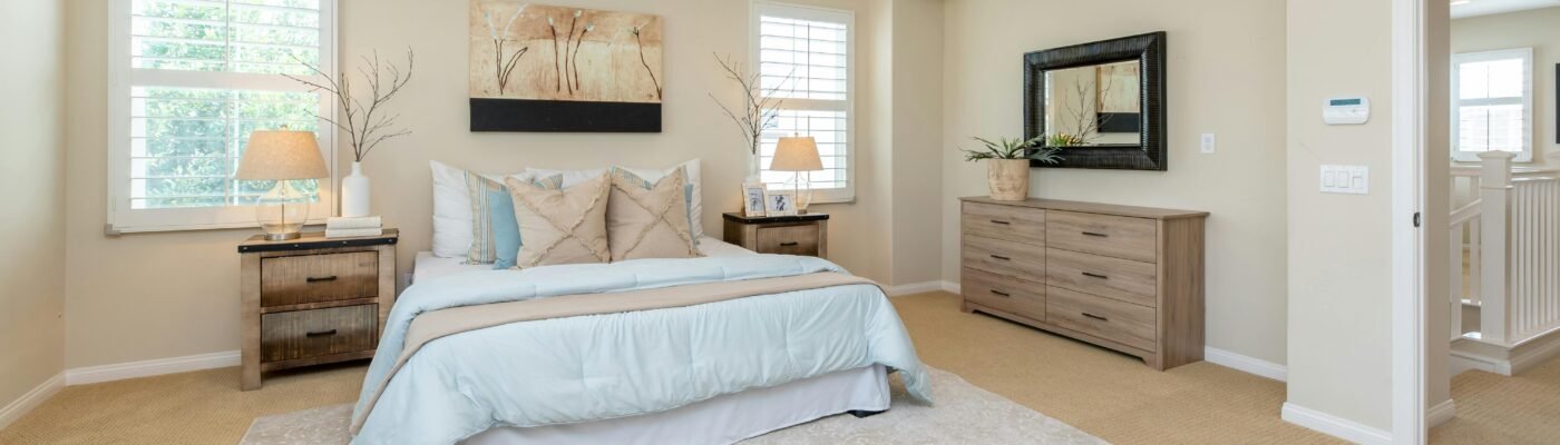 Bright modern bedroom with neutral decor and cozy ambiance, perfect for home decor inspiration.