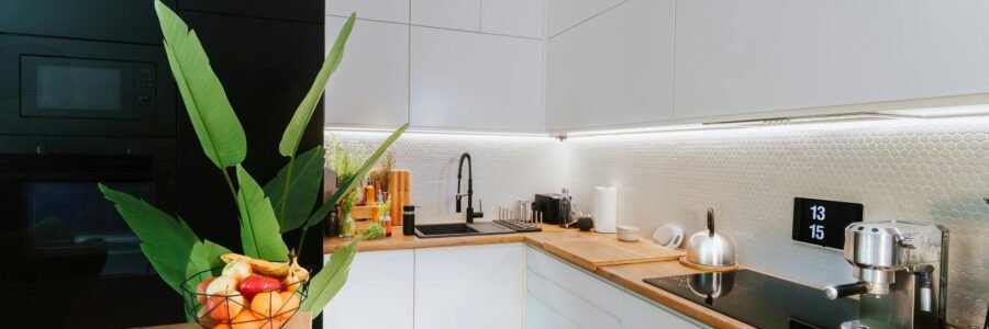 Sleek kitchen featuring smart tech and minimalist design, perfect for modern homes.