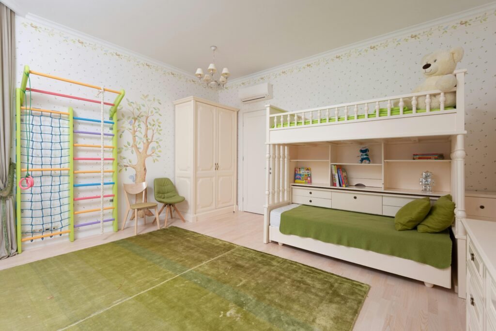 Bright and spacious children's bedroom with bunk bed and play area.