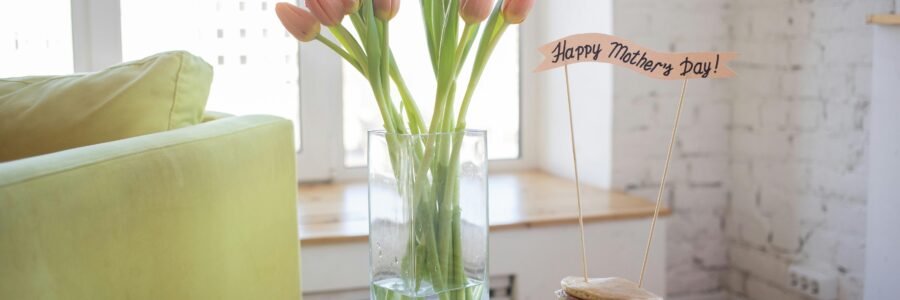 Bright and cozy Mother's Day setup with pancakes and tulips indoors.